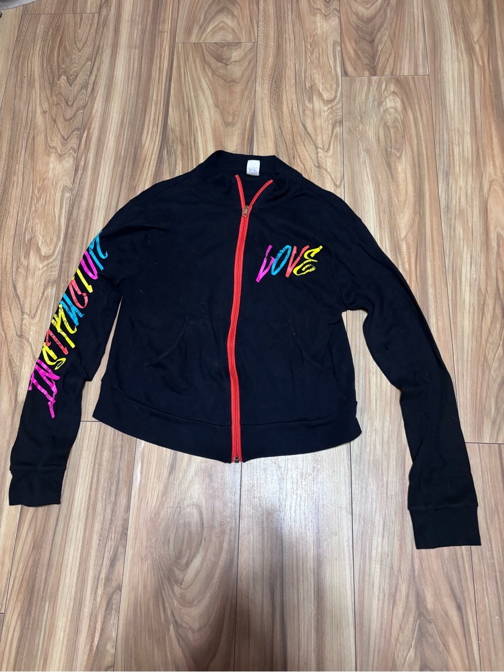 Zumba Black zip up jacket with multicolored Love on the front